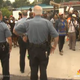 Several people gather to protest the shooting of unarmed teen Michael Brown, who was fatally shot by police in Ferguson, Mo., Aug. 9, 2014.
NBC 4 screenshot